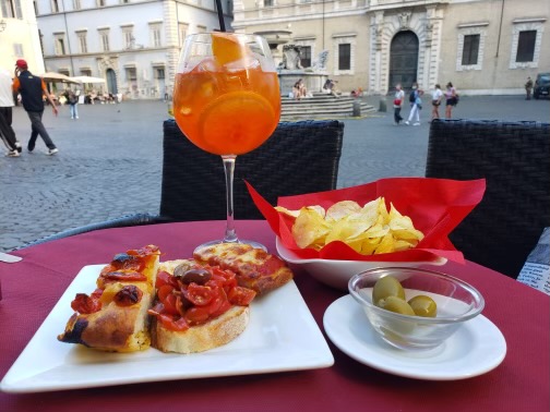 Aperol Spritz and appetizers in Trastevere, Italy