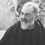 Padre Pio smiling