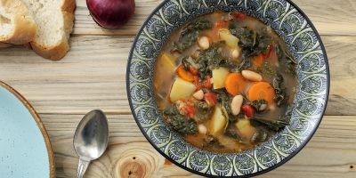 Tuscan Ribollita Soup with spoon and bread